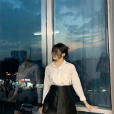 Q. T. T. Như