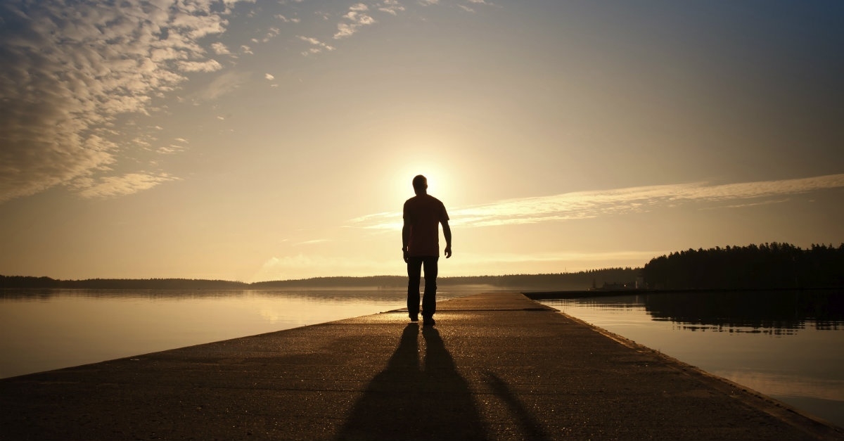 13235-man-alone-walks-water-path-road-sky-clouds-horizon.1200w.tn[1].jpg