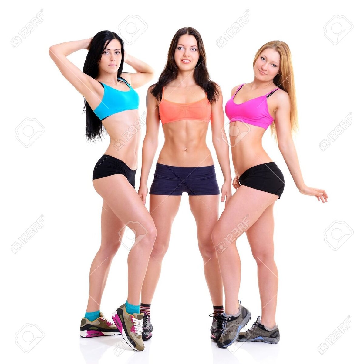 19873824-Three-Graces-fitness-girls-portrait-of-sport-young-women-with-perfect-bodies-studio-shot-over-white-Stock-Photo.jpg