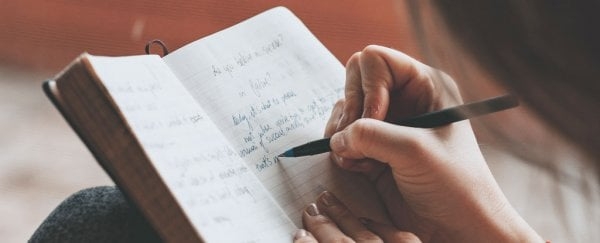 PersonWritingInJournalWithBlueInkPen_600.jpeg